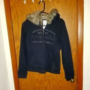 Coat with faux fur lining and hood